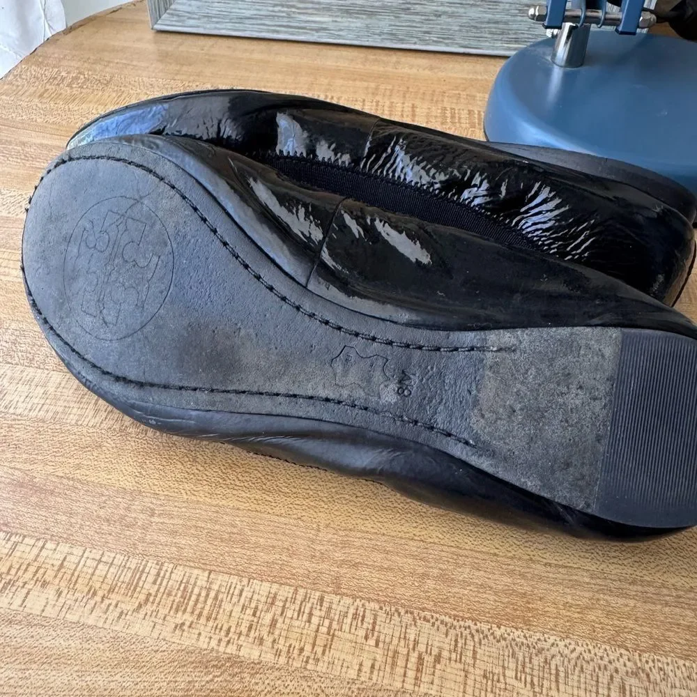 Tory Burch Black Leather Flats with Gold Medallion